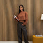 Pantaloni ampi in simil pelle marrone